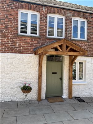 Devon Cottage with it's new porch!